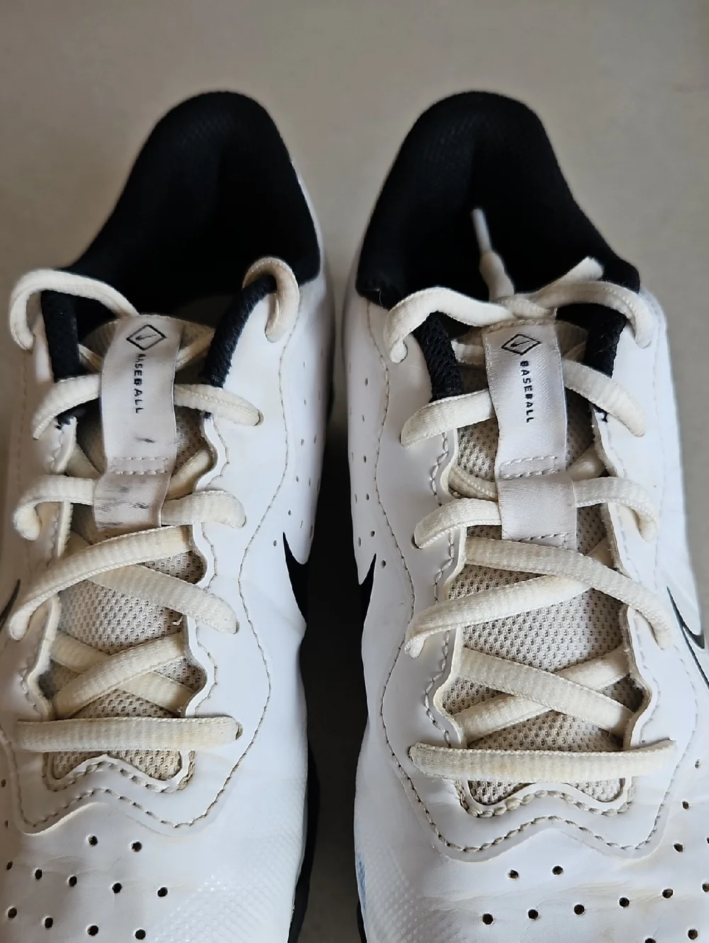Nike White And Black Baseball Cleats